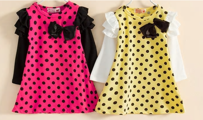 
            
                Load image into Gallery viewer, This fun polka dot dress is the perfect piece for a party! We have two vibrant colors in stock - Pink and Yellow. Both colors have long sleeves attached with ruffles on the shoulders. A bow sits on the left chest.
            
        