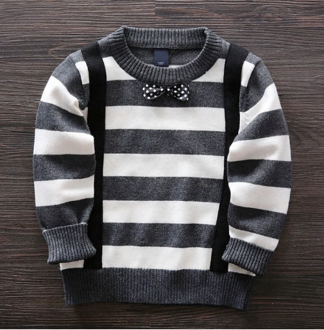 This trendy baby boy's grey striped sweater comes with attached suspenders and a black bow tie with white polka dots. 