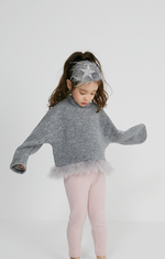 Our Petite Hailey Accessories are stunning! These feather headbands are the perfect touch for your budding fashionista. They match all of our dresses in the collection and come in four colors. The glitter shaped star sits on top of a wide feather extending throughout the headpiece