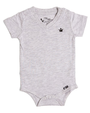 The Littlest Prince Gray Crown Logo Tee is sleek and simple which allows you to style it how you please! You can dress it up with a sports jacket or keep it cool with a pair of jeans. It is a v-neck style which keeps your little man totally stylish. Available in baby, toddler and tween sizes!