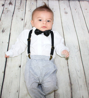 This trendy baby boy outfit is casually proper! The pants are super comfy (stretchy) and the bow tie and suspenders add a perfect fashionable touch!  Each set comes with stretchy pants, a white button down shirt, black bow tie and black suspenders.