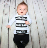 "Sorry girls, I only date models" This adorable baby boy 2 pieces set is for the little heart breakers. This set comes with the long sleeve shirt with graphics and pants with faux leather on the knees. Keep your little man super stylish and comfy during this Fall season. 