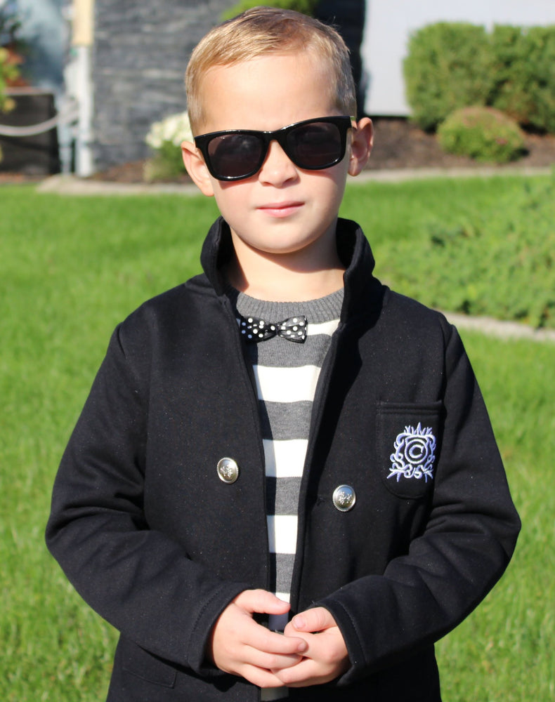 This BLACK blazer is perfect Fall gentlemen attire for you toddler boy. The collared jacket has 4 buttons lining the front and two in the back. We love this look with a white shirt and jeans. So adorable! 