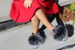 faux fur bunny ear shoes. The bunny ears are filled with black and charcoal rhinestones. 