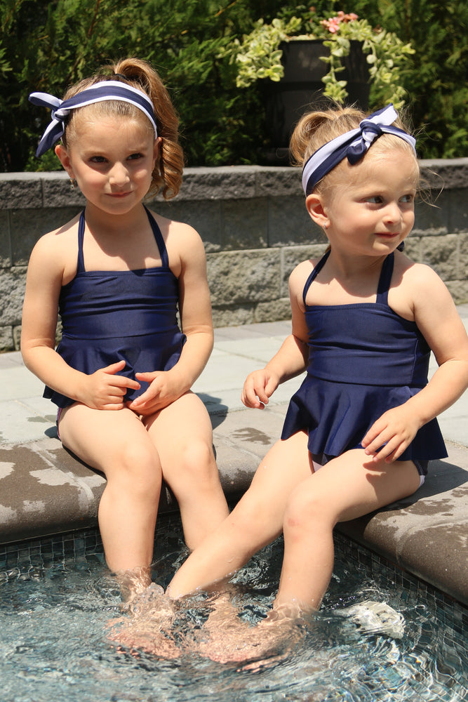 
            
                Load image into Gallery viewer, Get ready for The Hamptons with this Nautical Glam 3 piece suit. Set includes nautical colored bottom with 4 gold buttons, navy halter top and nautical striped head wrap. 
            
        