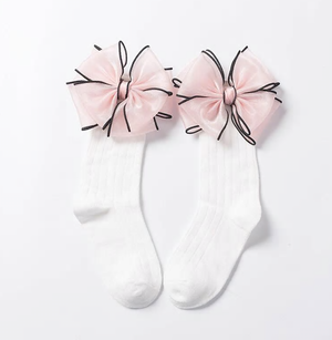 We love big bows and WE CANNOT LIE! Check out our new BIG bow plush socks. They come in two different colors black and pink. Depending on age, they can be worn as anklets or knee highs.  Fit for sizes 2yr-6yrs (can get away with a little smaller and a little bigger)